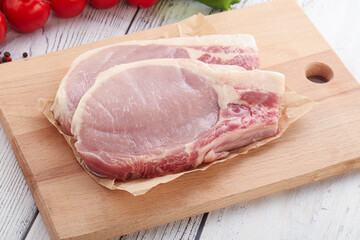 Raw pork t-bone steak for grill