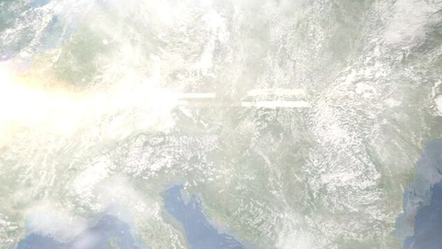 Earth zoom in from outer space to city. Zooming on Stockerau, Austria. The animation continues by zoom out through clouds and atmosphere into space. Images from NASA