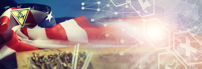 American flag, test tubes and biohazard sign. The concept of American biolabs and research centers.