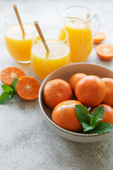 Glasses of fresh orange tangerine juice