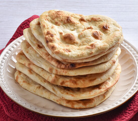 Tandoori Nan, A delicious and healthy wheat based flat bread, baked in clay oven. A famous bread of Pakistan, Afghanistan and Indian.
