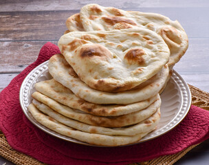 Tandoori Nan, A delicious and healthy wheat based flat bread, baked in clay oven. A famous bread of Pakistan, Afghanistan and Indian.
