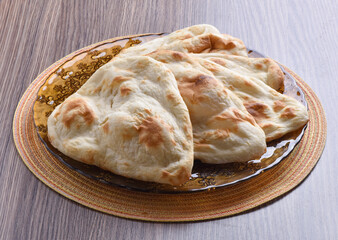 Tandoori Nan, A delicious and healthy wheat based flat bread, baked in clay oven. A famous bread of Pakistan, Afghanistan and Indian.