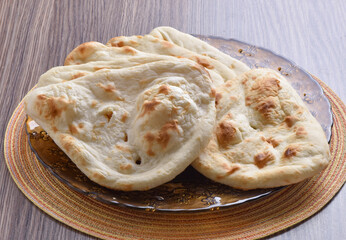 Tandoori Nan, A delicious and healthy wheat based flat bread, baked in clay oven. A famous bread of Pakistan, Afghanistan and Indian.