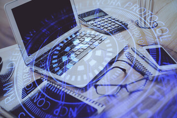 Double exposure of table with computer on background and data theme drawing. Concept of innovation.