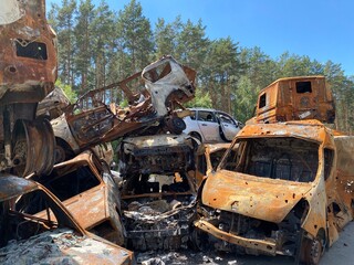 Car mortuary. Damaged cars in Irpen, near Bucha