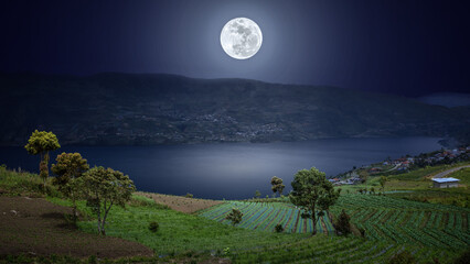 Lake in The Mountain in the night with full moon