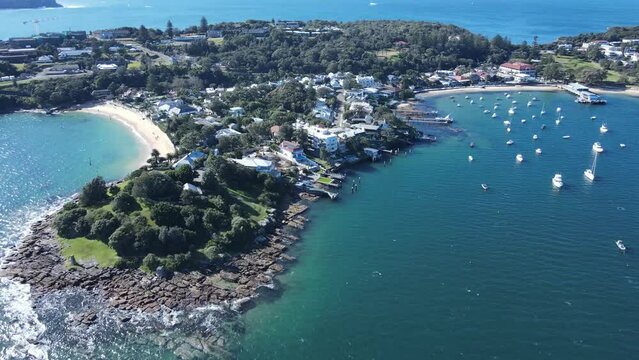 Aerial drone pullback view of Lady Bay Beach at Watsons Bay in East Sydney, NSW Australia on a sunny day 