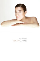 Natural Beauty Skincare and Spa Concept. Beautiful natural woman with nude makeup on a flawless skin