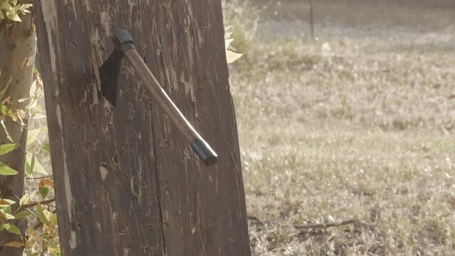 game of throwing hatchets on a wooden board