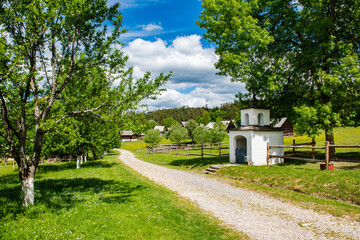 Obraz premium Wooden contemporary village near Stara Lubovna Castle in Slovakia
