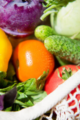 Eco string bag with fresh vegetables