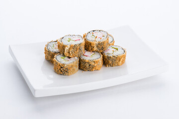 Sushi set and composition at white background. Japanese food restaurant, sushi maki gunkan roll plate or platter set.