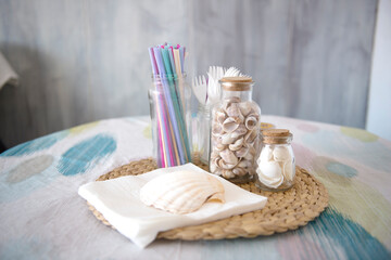 Centerpiece of a rustic house on the beach. with seashells
