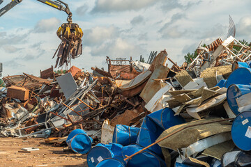 Processing industry, a pile of old scrap metal, ready for recycling. Scrap metal recycling.
