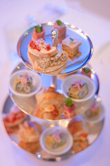 Assortment canape in hitea stand