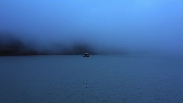 Nautical Vessel Moving In Sea Of Galilee During Foggy Weather In Morning - Golan Heights, Israel