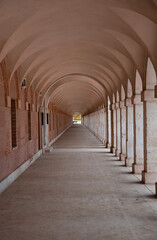 long corridor with arches in architecture