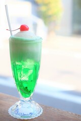 melon soda float with cherry