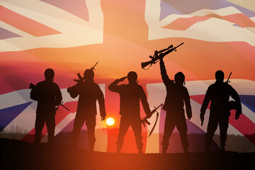 Silhouettes of soldiers on a background of United Kingdom flag. Greeting card for Poppy Day, Remembrance Day. United Kingdom celebration.