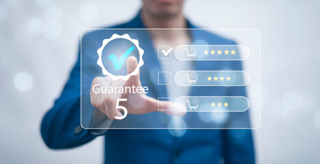 Quality assurance of business services, Businessman Hand shows the sign of the top service Quality assurance in Black background , Guarantee, Standards, ISO certification and standardization concept.