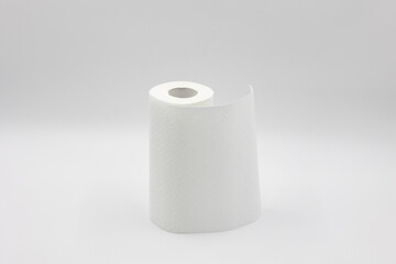 roll of white paper napkins for kitchen and cleaning on a white background