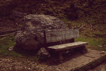 Wooden bench in the mountain valley