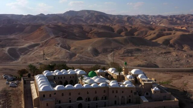 Aerial Forward Shot Of Ancient Islamic Structure In Judean Desert On Hills - An-Nabi Musa, Israel