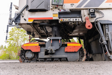  Large Road cold milling machine removes the old asphalt and loading 