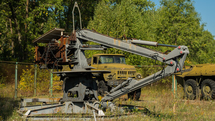 Museum of special equipment that helped cleaning Chernobyl nuclear power plant after the explosion in the city of Pripyat. Exclusion Zone in summer on a sunny day. Radiation