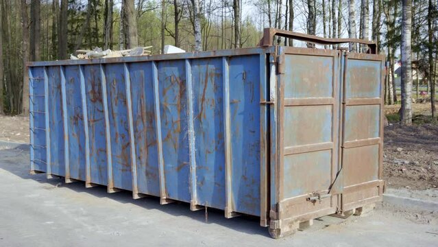 garbage container equipped for transportation by truck