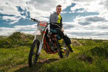 Fototapeta na wymiar Motocross training. rider with dirtbike.