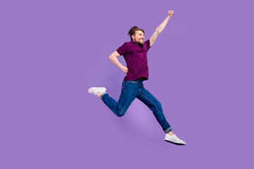 Fototapeta na wymiar Full size profile side photo of young man go walk superhero jumper isolated over violet color background