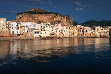 Fototapeta premium Beautiful view over a beach town of Cefalu, medieval village of Sicily island, Province of Palermo, Italy