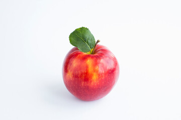 Closeup on red apple on the white background. Copy space.