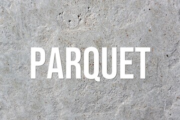 PARQUET - word on concrete background. Cement floor, wall.