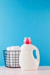 A white bottle with liquid gel for washing clothes. Concept of cleaning, laundry