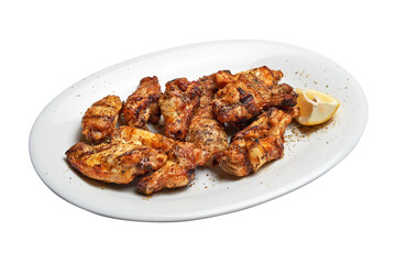 White plate with roasted chicken wings.
