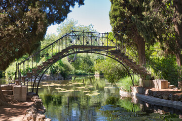 Bridge in the park “el “capricho” Madrid, Spain.