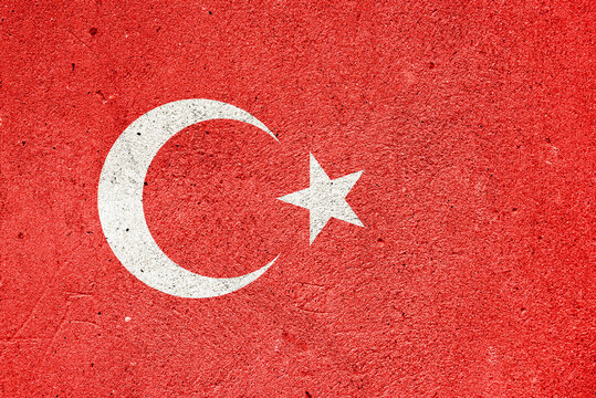 Photograph of the flag of Turkey painted on cement plaster