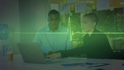 Animation of cardiograph over diverse business people using laptop - Powered by Adobe