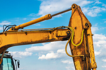 Excavator close-up. Details of a heavy mining excavator. Elements of heavy construction equipment for earthworks.