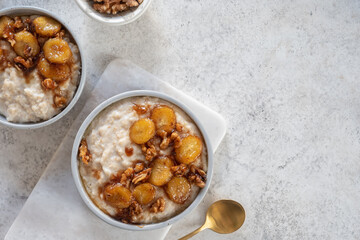 Porridge with caramelised banana and walnut for healthy breakfast