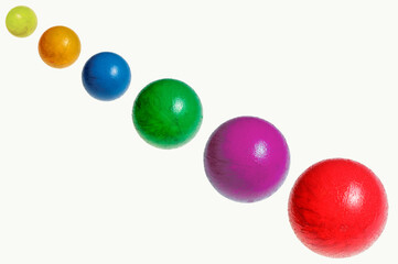 balls of different colors on a white background