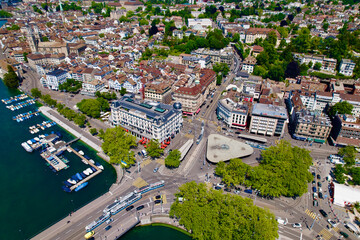 Aerial view of City of Zürich with Quay Bridge, River Limmat, Bellevue Square and the medieval old town on a sunny spring day. Photo taken May 30th, 2022, Zurich, Switzerland.