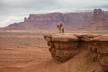 Man on a Horse at John Ford Point in Monument Valley