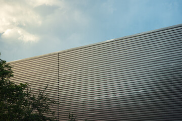 Fototapeta na wymiar Warehouse wall metal texture surface in industrial estate in england, uk