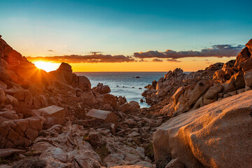 Fototapeta na wymiar tranquil sunset at Capo Testa on Sardinia