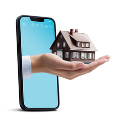 Hand holding a model house