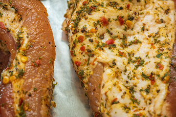 Raw seasoned marinated pork belly meat for bbq